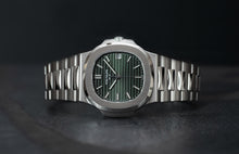 Load image into Gallery viewer, [New] Patek Philippe Nautilus 5711/1A-014 | Date • Sweep Seconds
